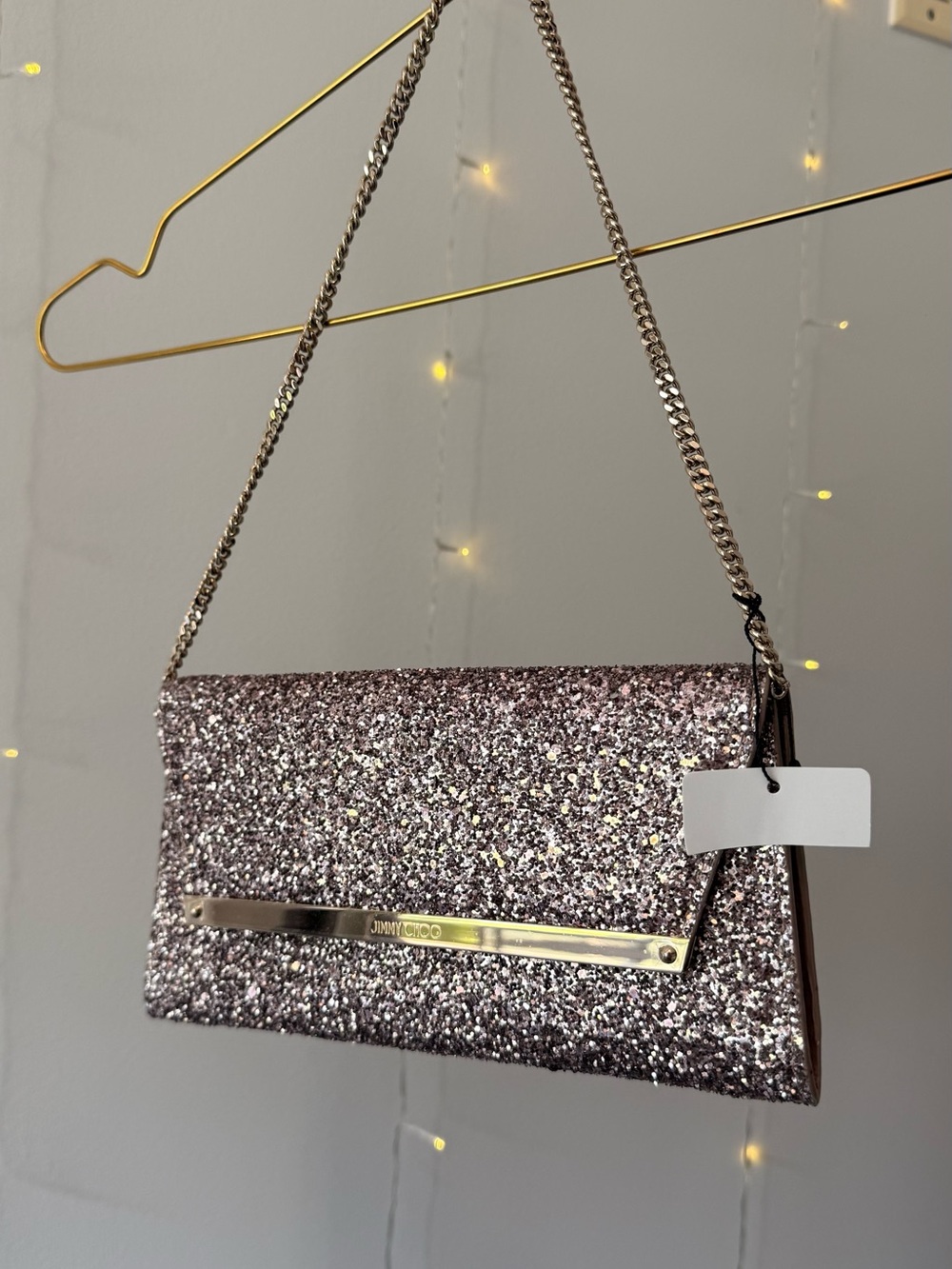 Jimmy Choo Margot Chain Clutch with Gold Bar – Tea Rose Glitter
Brand New in Box